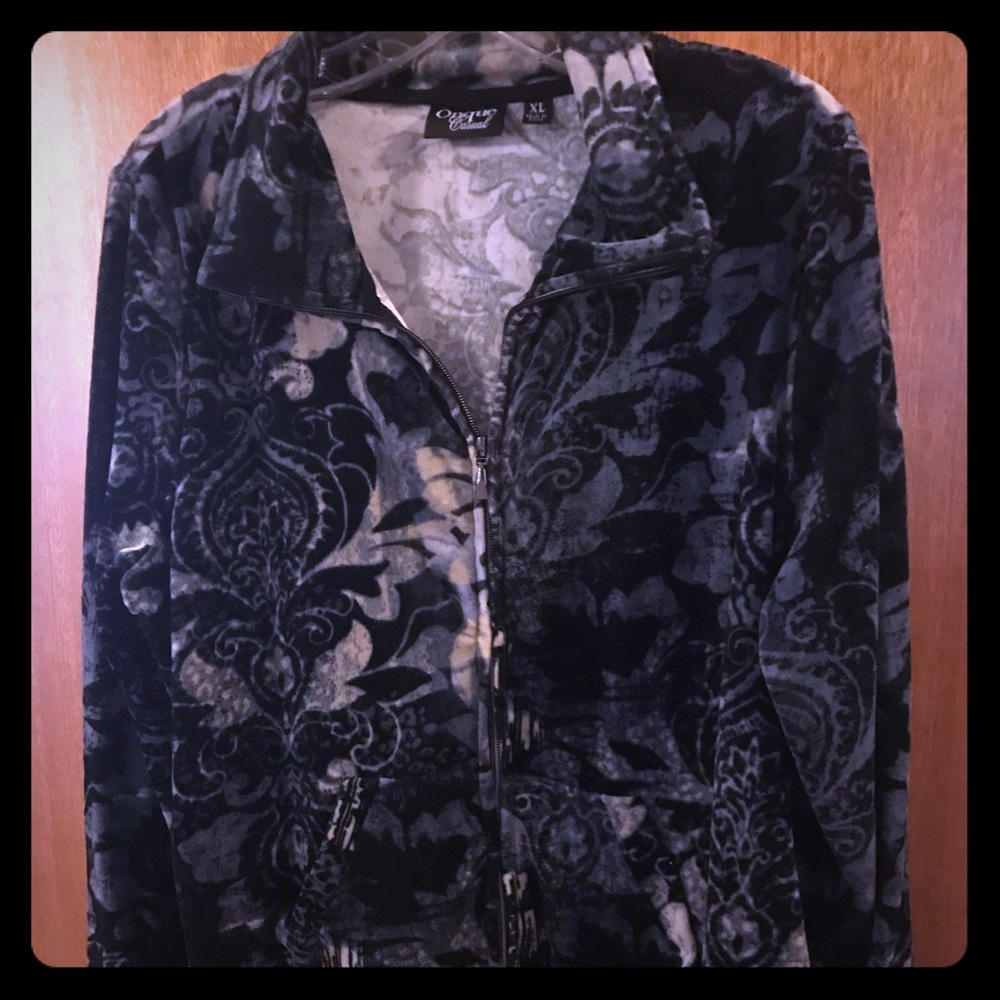 Velour jacket with front zipper.